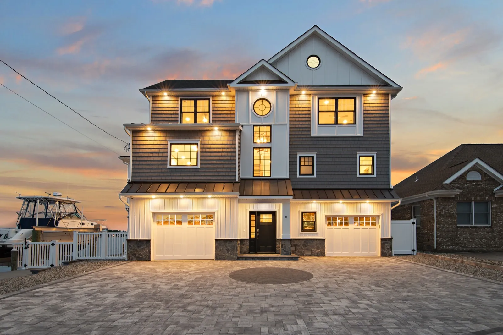Finished bayfront custom home at twilight, Brick Township NJ